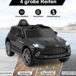 Elektrisches Kinderauto Aston Martin lizenzierter Elektrofahrzeug mit Hupe Musik & LED-Lichtern Schwarz