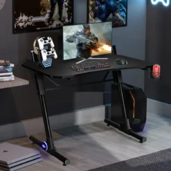 Gaming-Schreibtisch höhenverstellbarer Computertisch mit blauer LED-Beleuchtung Schwarz