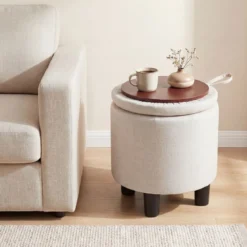 Runder Sitzhocker aus Leinen Ø38 cm gepolsterter Fußhocker mit Stauraum Beige