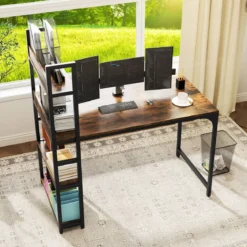 Schreibtisch mit Ladestation 120 x 65 cm Computertisch mit offenem Bücherregal Braun/Natur