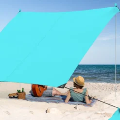 Strandzelt 230 x 200 cm UPF 50+ Sonnenzelt mit Sandankern Sandsäcken und 2 Stützstangen Türkis